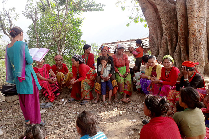 A peer educator in Doti conducts a session on menstruation, menstrual hygiene, and myths regarding chhaupadi and different forms of discrimination during menstruation. Photo Courtesy of Rupa Joshi.
