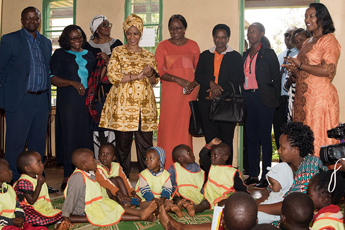  UN Women Executive Director Phumzile Mlambo-Ngcuka and Esperance Nyirasafari, Rwanda’s Minister of Gender and Family Promotion (pictured at right), and UN Women representatives visit the Nyagatovu Early Childhood Development and Family Centre. Photo: UN Women/Franz Stapelberg