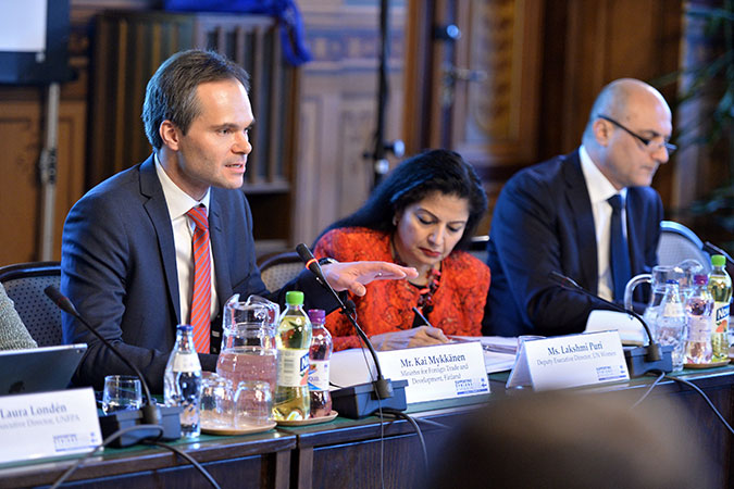 Kai Mykkänen, Minister for Foreign Trade and Development of Finland and Lakshmi Puri, UN Women Deputy Executive Director participate in a panel discussion during the Helsinki Conference on Syria. Photo: Ulkoministeriö Finland