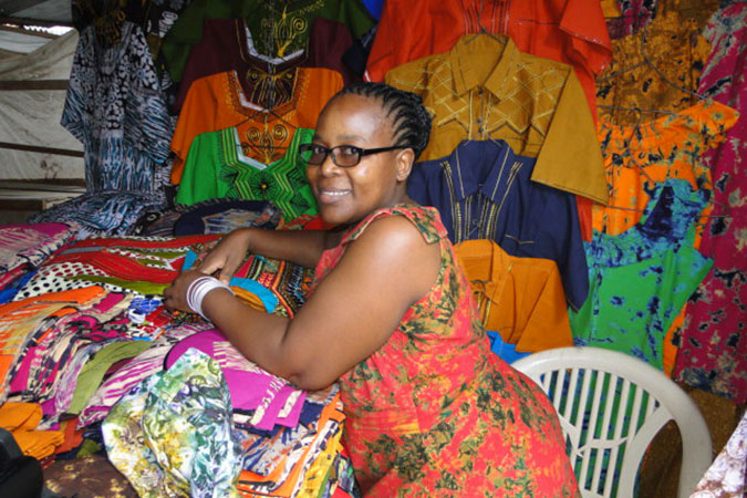 Evah Kakobe at work as a market vendor at Mchikichini market in the city of Dar es Salaam, Tanzania. Photo: Equality for Growth