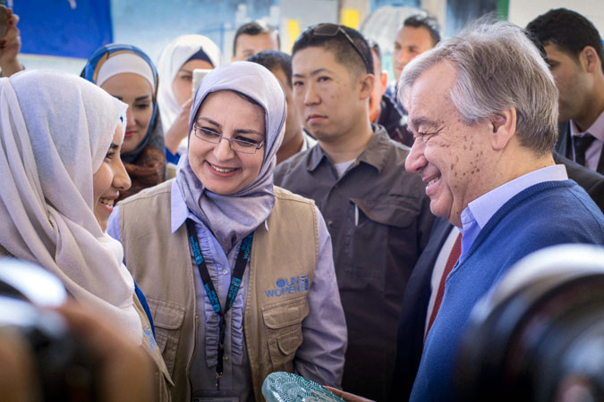 Secretary-General António Guterres received a mosaic made by Syrian women refugees participating in the UN Women handicraft workshop in the Za’atari refugee camp. In this photograph, the mosaic is handed over by Manar Al Nabulsi, a young refugee woman who benefitted from her work in the Oasis. Photo: UN Women/ Benoît Almeras