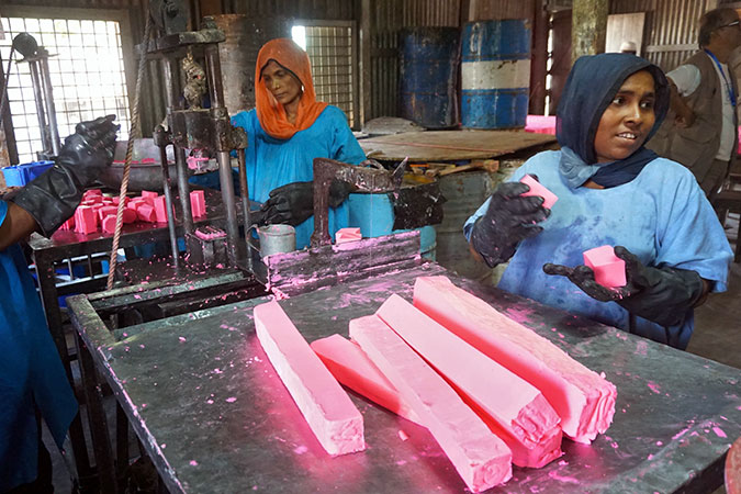 UN Women and UNHCR have been working together to provide cash for work opportunities for Rohingya refugee women since 2014. Here in Kutupalong refugee camp in Cox’s Bazar through soap making that is used for dignity kits for the new arrivals. Photo: UN Women/Theresia Thylin