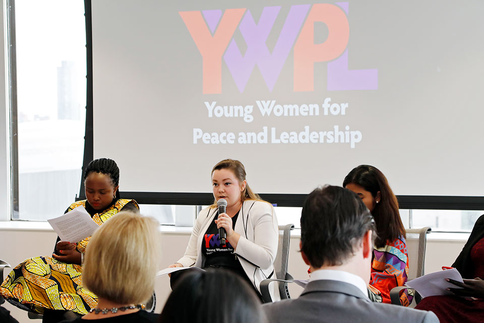 Katrina Leclerc, a Programme Coordinator for the Global Network of Women Peacebuilders Young Women for Peace and Leadership programme speaks at the young women peacebuilders event. Photo: UN Women/Jodie Mann