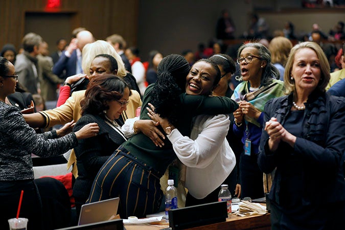 Participants at the 62nd session of the UN Commission on the Status of Women rejoice as the Commission adopts Agreed Conclusions to ensure the rights and development of rural women and girls. Photo: UN Women/Ryan Brown