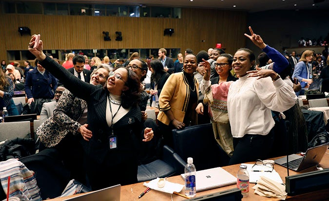 Participants at the 62nd session of the UN Commission on the Status of Women celebrate the adoption of CSW62 Agreed Conclusions Photo: UN Women/Ryan Brown