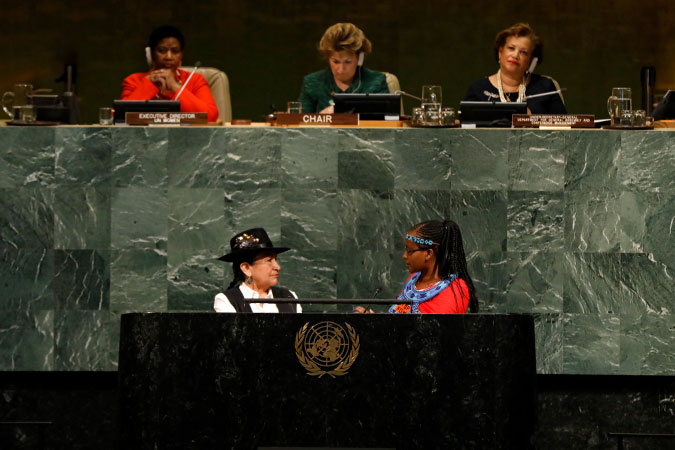 Activists Tarcila Rivera Zea from, Peru and  Purity Soinato Oiyie, from Kenya at theopening plenary of the 62nd session of the  UN Commission on the Status of Women. Photo: UN Women/Ryan Brown