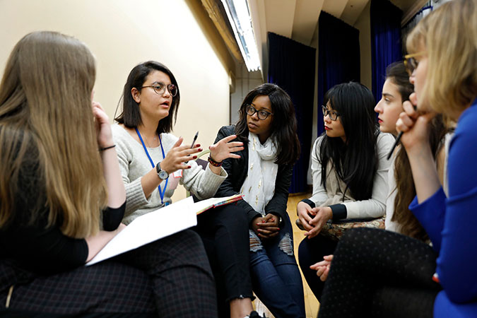 Young activists talk together during a breakout session of the CSW62 Youth Forum. Photo: UN Women/Ryan Brown
