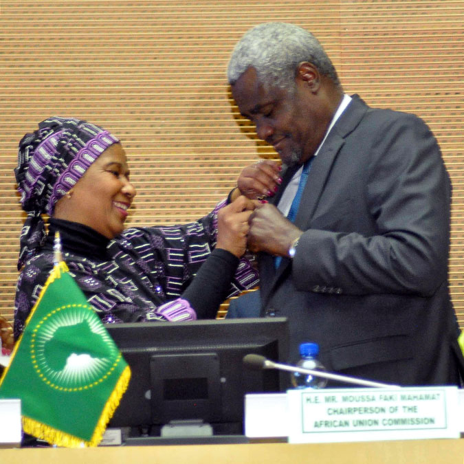 The Chairperson of African Union, Moussa Faki Mahamat received the HeForShe pin from UN Women Executive Director during the opening ceremony. Photo: UN Women