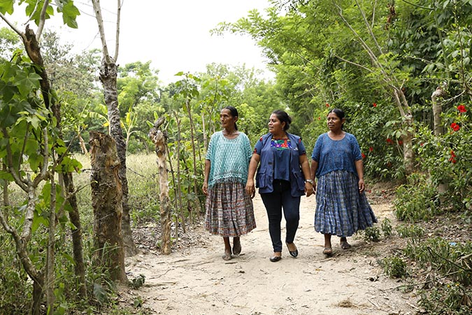 The UN Women-supported economic programme has helped women from the community to become economically self-sufficient. At right is 55-year-old Candelaria Pec, whose living conditions have improved. Photo: UN Women/Ryan Brown