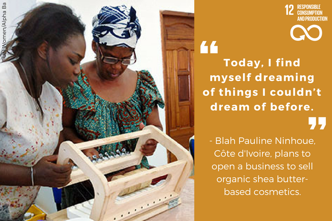 Blah Pauline Ninhouet during a soap-cutting exercise with UN Women expert, Mame Khary Diene Expert in a production workshop for the preparations of the International Exhibition of Agriculture in Abidjan. Photo: UN Women/Alpha Ba