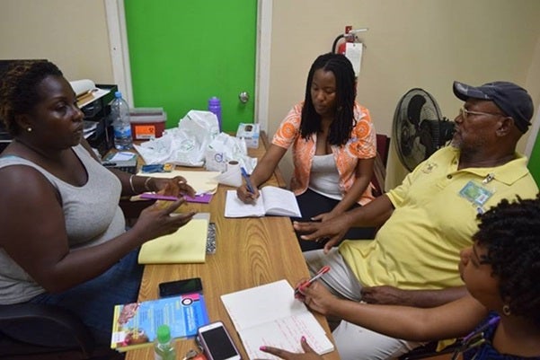 (from left) Samantha Burnette Shelter Manager, Tonni Brodber Deputy Representative UN Women MCO, Desmond Thomas Shelter Coordinator with the National Office of Disaster Services (NODS), and Farmala Jacobs, Executive Director (ag) Directorate Of Gender Affair. Photo: DoGA/Clovis St. Romain.