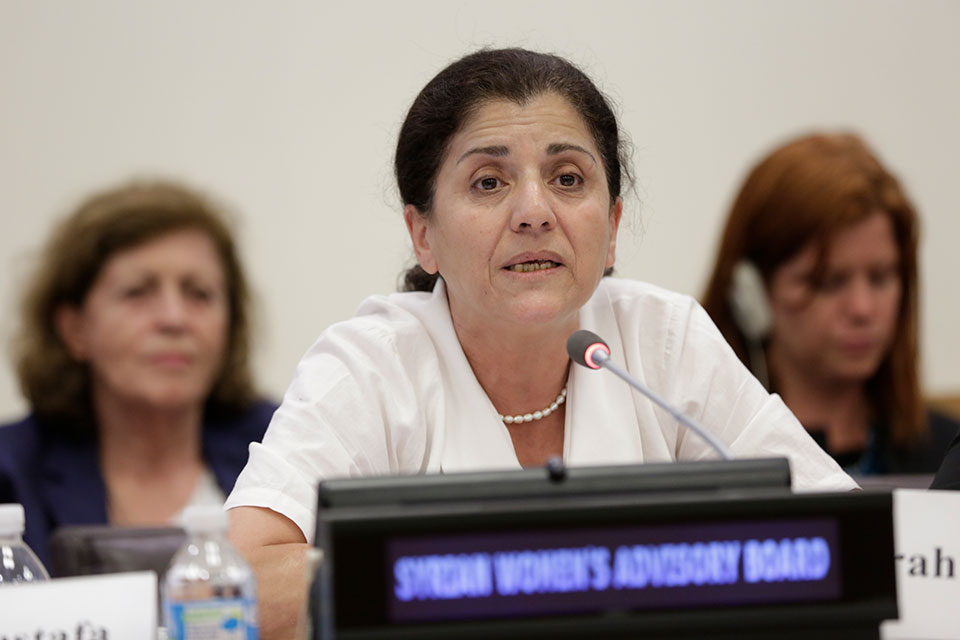Monira Hwaijeh, one of the 12 members of the Syrian Women’s Advisory Board speaks at an event at UN Headquarters in New York. Photo: UN Women/Ryan Brown