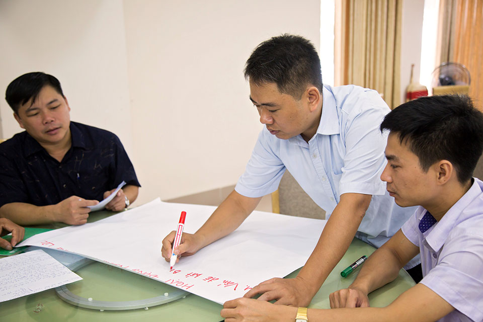 “The training on gender responsive budgeting is very helpful for our work”, said Mr. Thang (left), a Tay ethnic minority participant in gender-responsive budgeting training in July 2018. Photo: UN Women/Phuong Anh