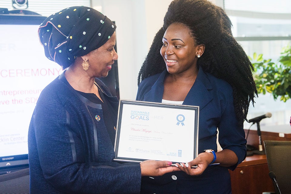 UN Women Executive Director with the SDGs and Her Competition second-place winner Charlot Magay, owner of Mukuru Clean Stoves of Kenya. Photo: UN Women/Amanda Voisard