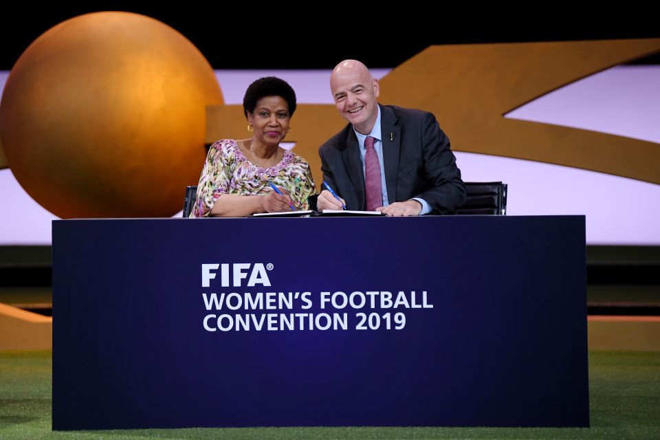 Gianni Infantino, FIFA President (R) and Phumzile MIambo-Ngcuka, United Nations Under-Secretary-General and Executive Director of UN Women (L) sign a Memorandum of Understanding during the FIFA Women's Football Convention in Paris, France. Photo: Mike Hewitt - FIFA/FIFA via Getty Images