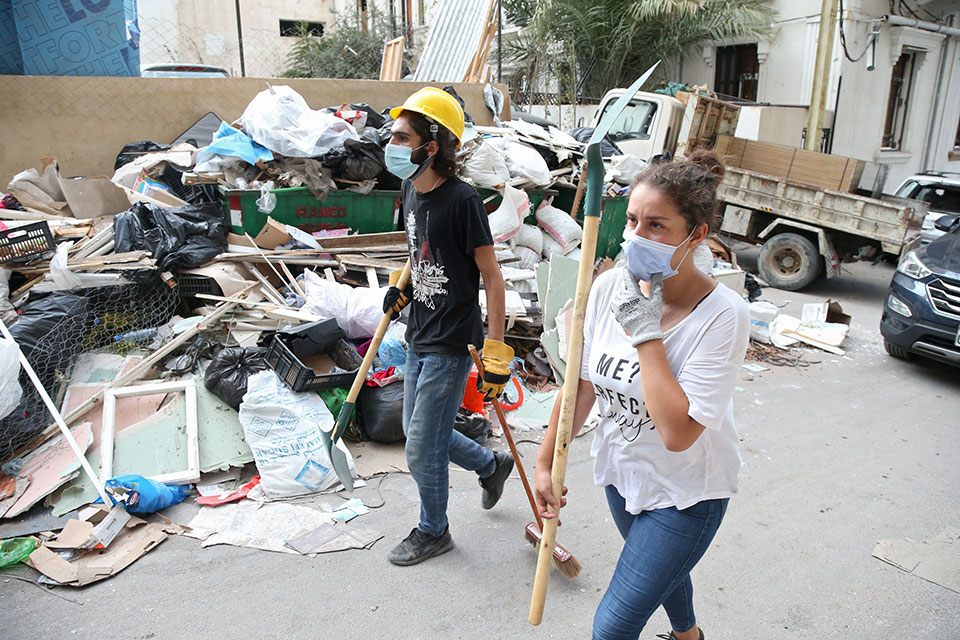 Lebanese youth team up to clean streets following the Beirut blast. Gemmayze, Beirut, August 6, 2020. Photo: Dar Al Mussawir