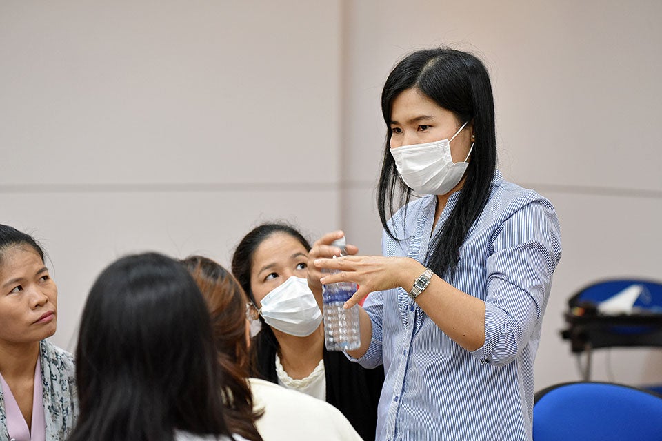 Nan Zar Ni Myint works to raise awareness of the rights of migrant domestic workers in Thailand. Photo: UN Women/Kith&Kin