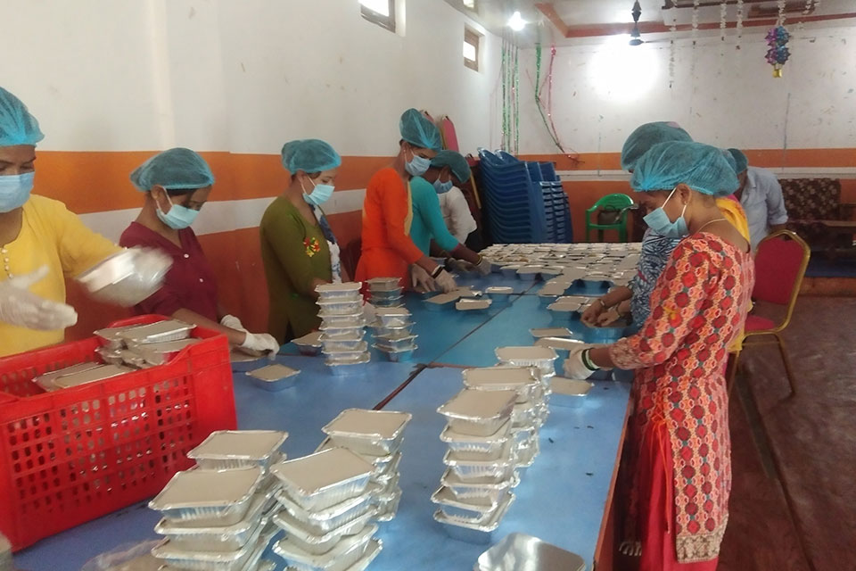 The community kitchen employs a team of eight women who start working at 5am in order to have the meals ready for distribution by 9 a.m. Photo courtesy of Maiti Nepal