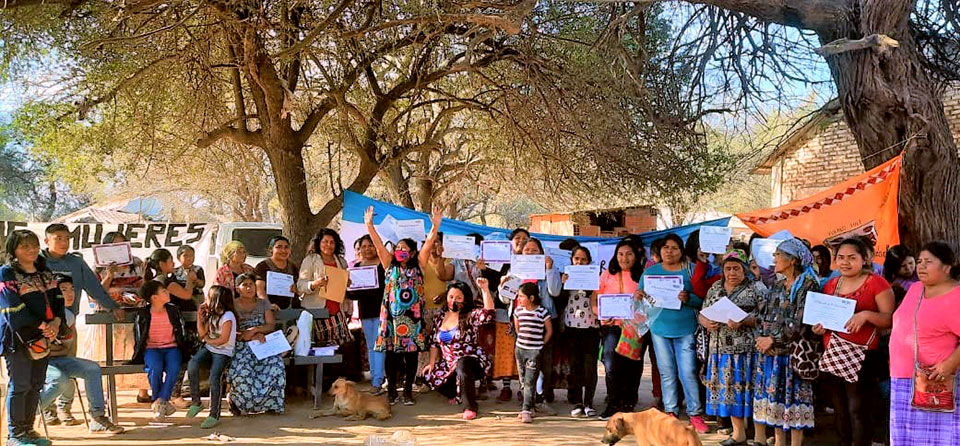 Women and girls from the Wichí Indigenous communities of El Carboncito in Salta Province pose with their certificates of completion from the trainings sponsored by the Spotlight Initiative. Photo courtesy of FOMUPIO/Irene Cari