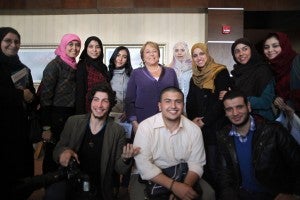 UN Women Executive Director Michelle Bachelet poses with audience members following a forum with youth and civil society in Tripoli, Libya on Monday 12 March 2012.   UN Photo/Iason Foounten