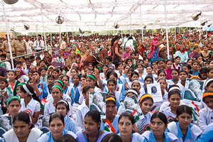 Men and women gather to promote the rights of girls and education for all