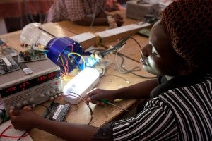 woman testing solar light