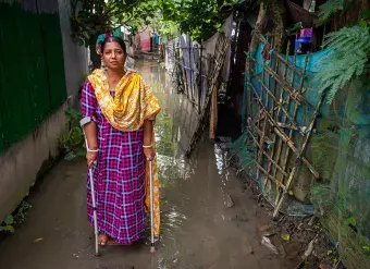 Sunita Roy, 40, lives in Chalna at Dacope upazila in Khulna. She lost work and income due to the COVID-19 pandemic before her family’s home was damaged by Cyclone Amphan in 2020. Photo: UN Women/Fahad Kaizer