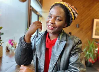 Esther Mwema, from Zambia, is a 28-year-old digital inequalities expert and the founder of Digital Grassroots. Photo courtesy of Esther Mwema.