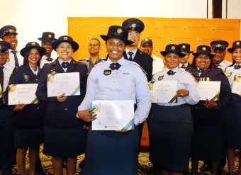 Officers are seen graduating from a gender-responsive policing course in South Africa on 1 December 2023. 