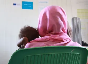 A mother and her one-year-old daughter with severe acute malnutrition receive treatment at the Hayal Arab health facility in Atbara, River Nile state, Sudan.