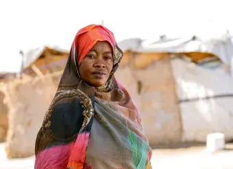 Rabha, a beneficiary of UN Women's humanitarian assistance at Saada and Salaam gathering site in Port Sudan. Through women-led organizations across the country, UN Women gives various forms of humanitarian support to the women and girls of Sudan including psychosocial, provision of dignity kits and sensitization on their rights. Photo: UN Women/Ekram Hamad Fadlalla