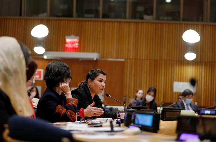 Horia Mosadiq, an Afghan woman and founder and director of Safety and Risk Mitigation Organization, addresses the CSW66 side event on the upcoming renewal of the UNAMA mandate. Photo: UN Women/Ryan Brown