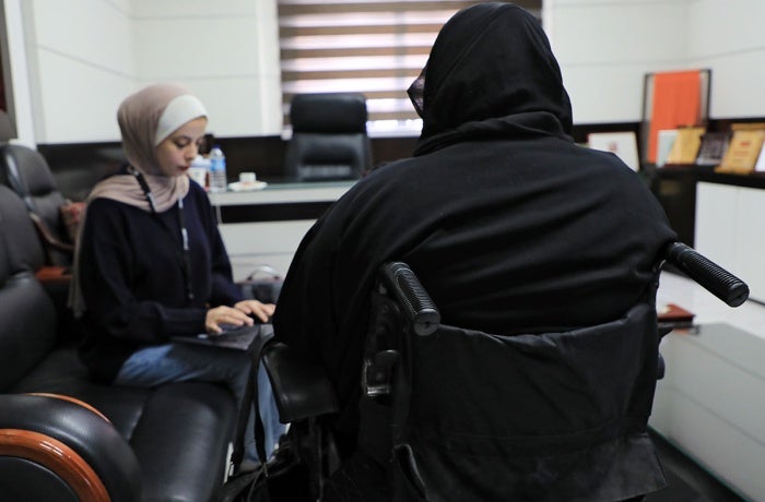 Interview of a refugee woman with disability from the Gaza Strip who received cash assistance and a cash-for-work opportunity through the CERF programme. The livelihood assistance was paired with skill development trainings and gender-based violence (GBV) protection services, including legal counselling, awareness-raising sessions, and psychosocial support. Photo: UN Women.