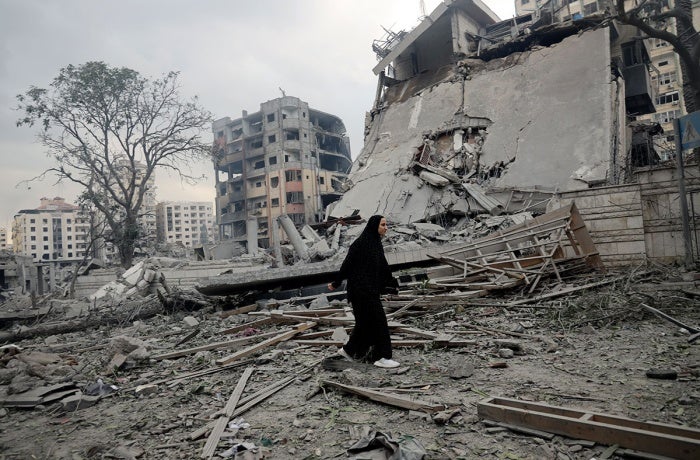 Families flee their shattered homes in Tal al-Hawa neighbourhood, seeking refuge in the southern Gaza Strip.