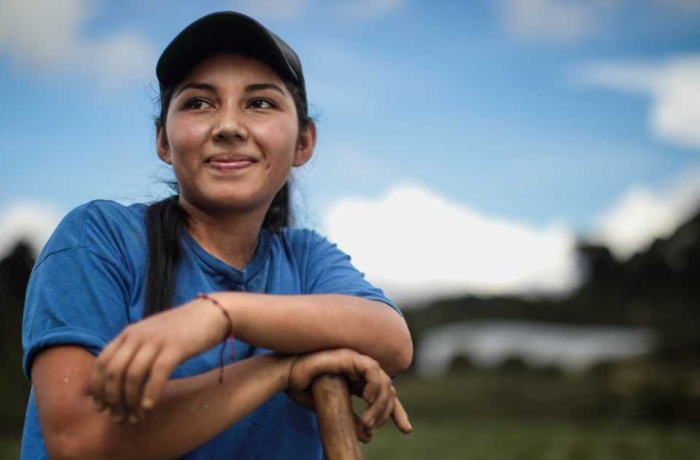 Photo of Flor de María Ramos, a young farmer and single mother from El Salvador.