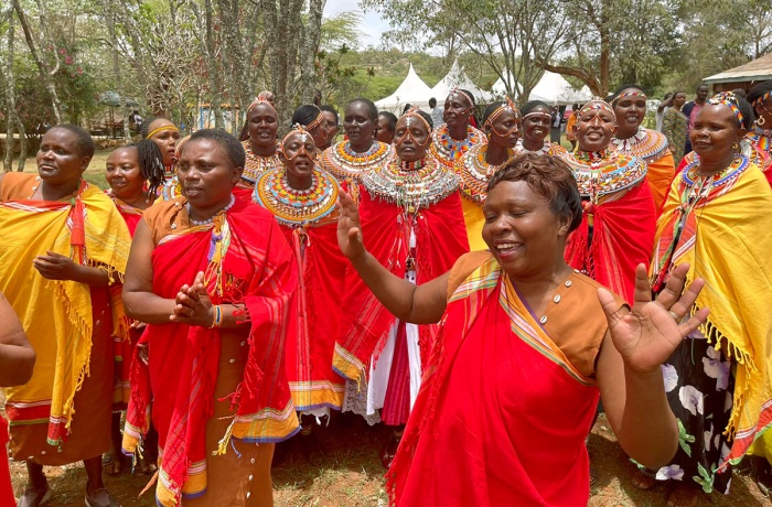 People take part in celebrations to mark the signing of declarations by council of elders in Kenya's Samburu and Mt. Elgon regions to end the practice of female genital mutilation.