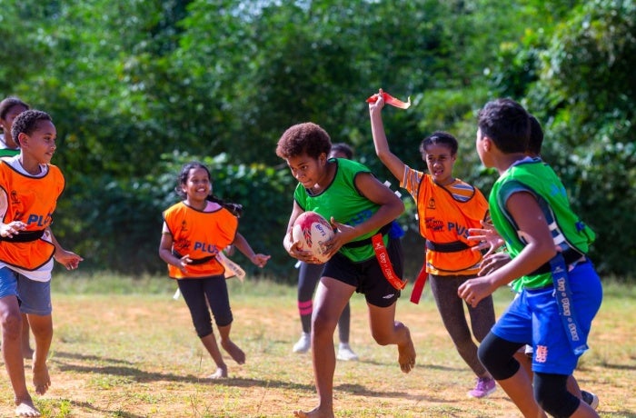 Girls are seen participating in the Get into Rugby PLUS programme in Fiji.