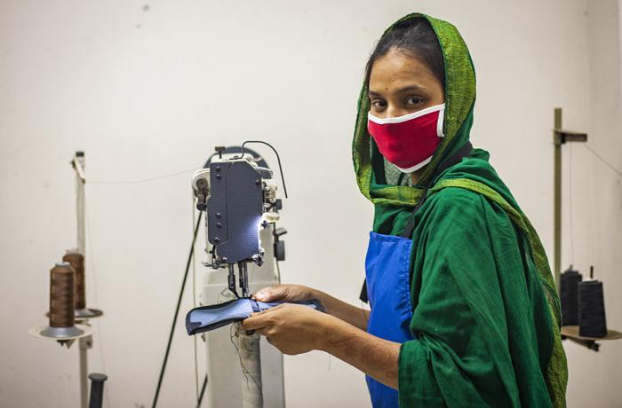Riya Akter, 22, is an apparel worker, just like her husband. Asked if she was afraid of becoming infected with coronavirus, she said work came first and needed to be done, otherwise there would not be food on the table.  She works while maintaining social