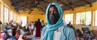 A woman is seen at a poultry farm in Sudan that now hosts hundreds of people displaced by the country's civil war.