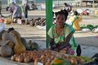 A woman vendor in Gerehu market in Port Moresby, Papua New Guinea has benefited from safety improvements to the market infrastructure.