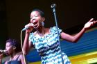 Umuhire Solange Liza, winner of the “Sing yes to Kigali City” song competition, performs at an event at the Amahoro Petit National Stadium in Kigali to implement the community mobilization strategy in the Kigali Safe City Programme, and commemorate the In