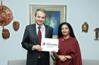 UN Women Deputy Executive Director Lakshmi Puri met with José Luis Rodriguez Zapatero, former prime minister of Spain and President of the Institute for Cultural Diplomacy Advisory Board, and placed a HeForShe pin on his lapel. Photo: Ryan Brown/UN Women