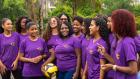 Kathely Rosa, 19, pictured center with ball, with other graduates of the One Win Leads to Another programme in Brazil. Photos: UN Women/Camille Miranda